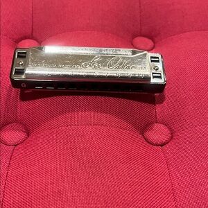 Lee Oskar Black and Silver Harmonica